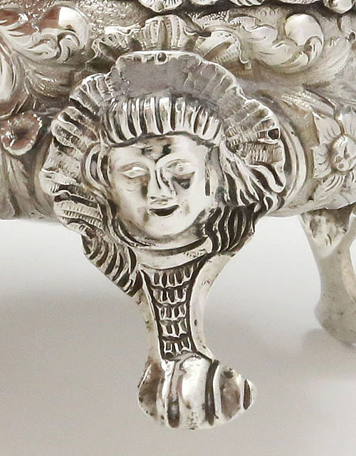detail of foor on English antique silver open salt