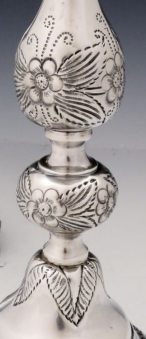 detail of antique sterling silver candlesrticks London 1919