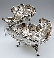 French silver kidney shaped dishes with floral swags and scrolls