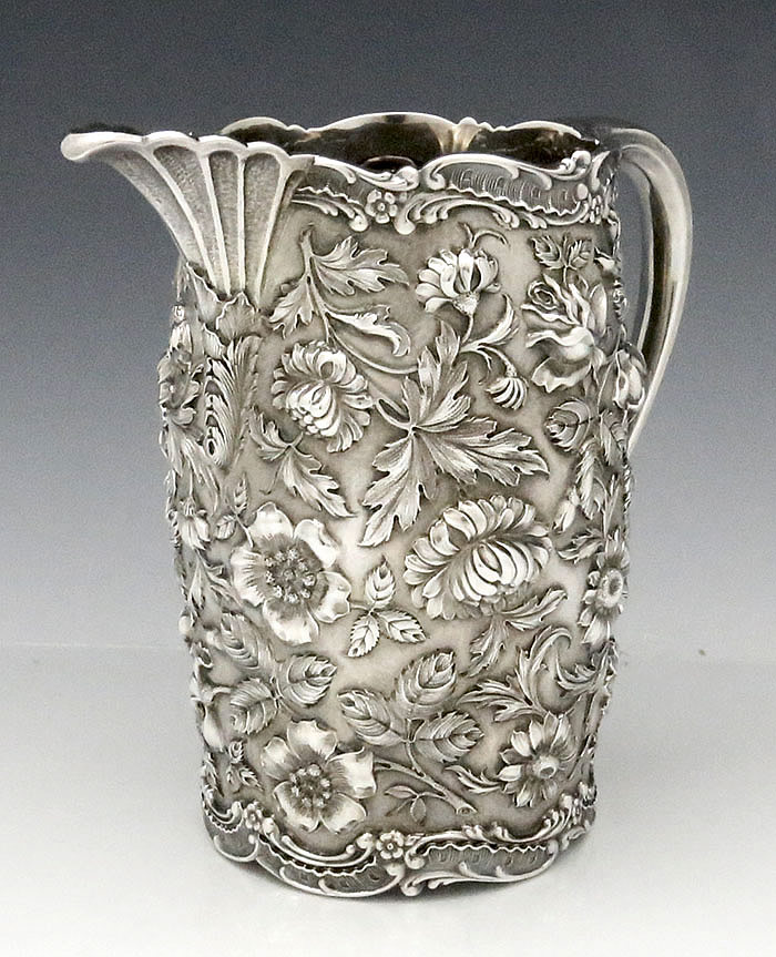 Jenkins  and Jenkins repousse sterling pitcher