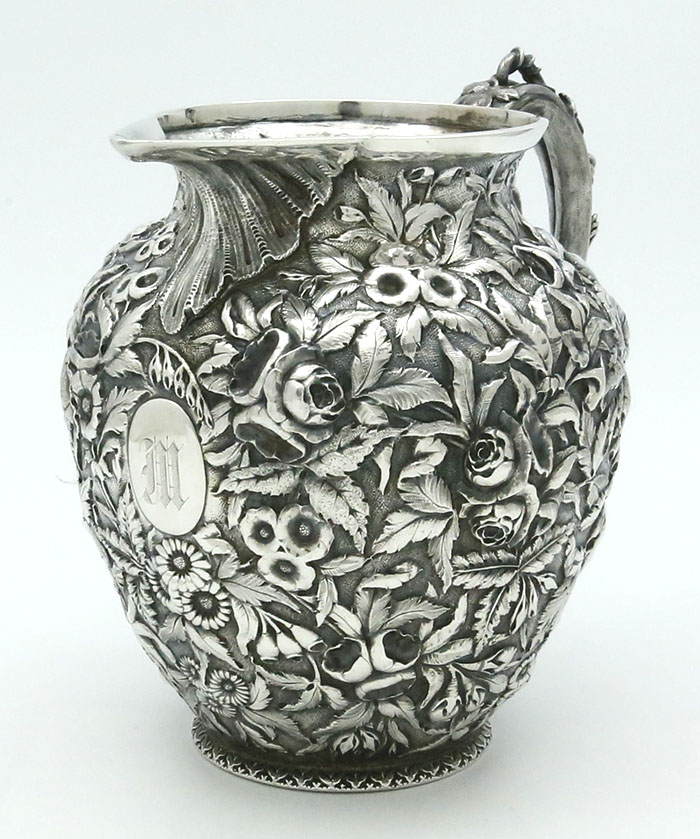 repousse silver pitcher by S Kirk & Son Baltimore