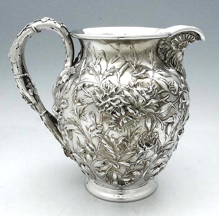 S Kirk and Son Co sterling floral repousse pitcher