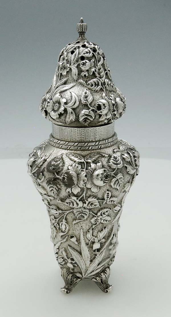 Sugar shaker by Kirk in the repousse pattern with roses