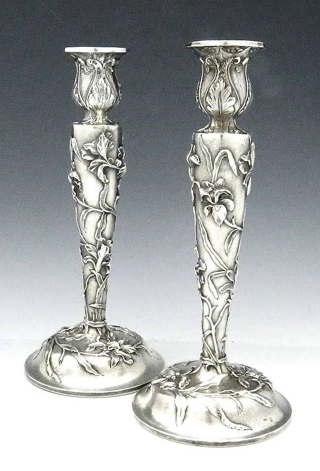 pair of antique sterling silver candlesticks