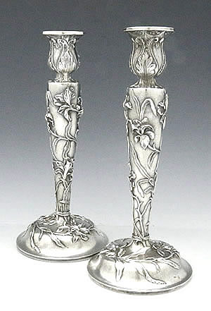 pair of Kirk repousse antique sterling silver candlesticks