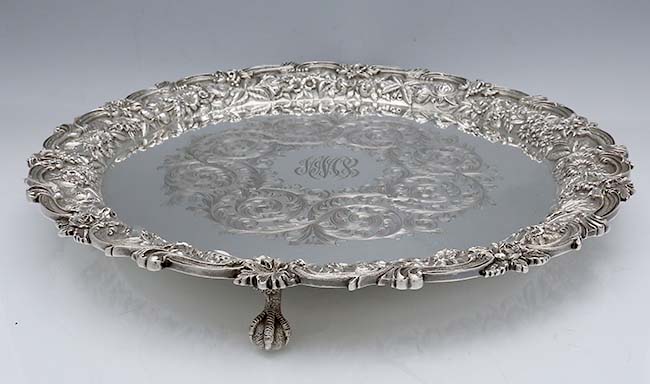 Large Kirk repousse engraved footed salver tray