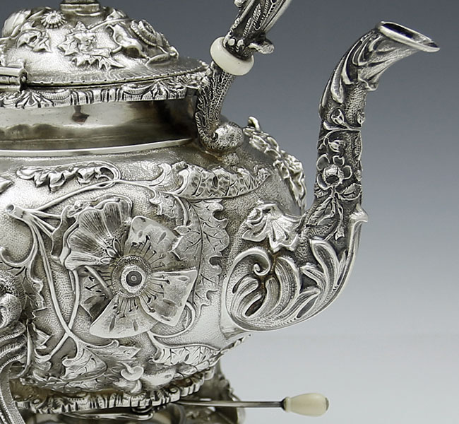 detail of Kirk repousse kettle sterling silver
