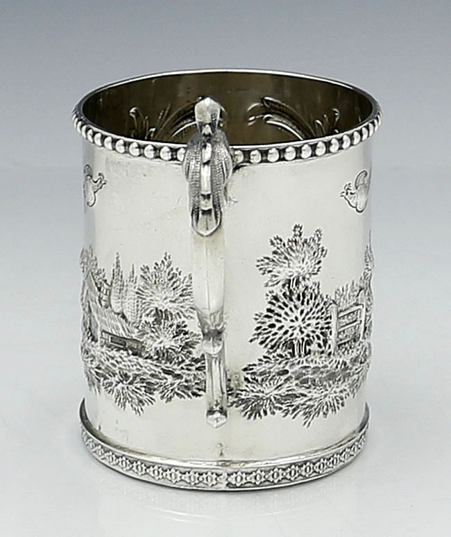 Handle of American coin silver antique landscape mug
