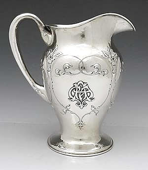 Lebolt antique sterling pitcher hand hammered and chased