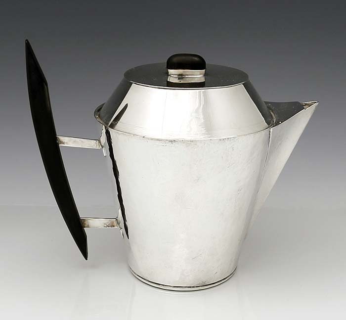 modern hand hammered pot with wood handles