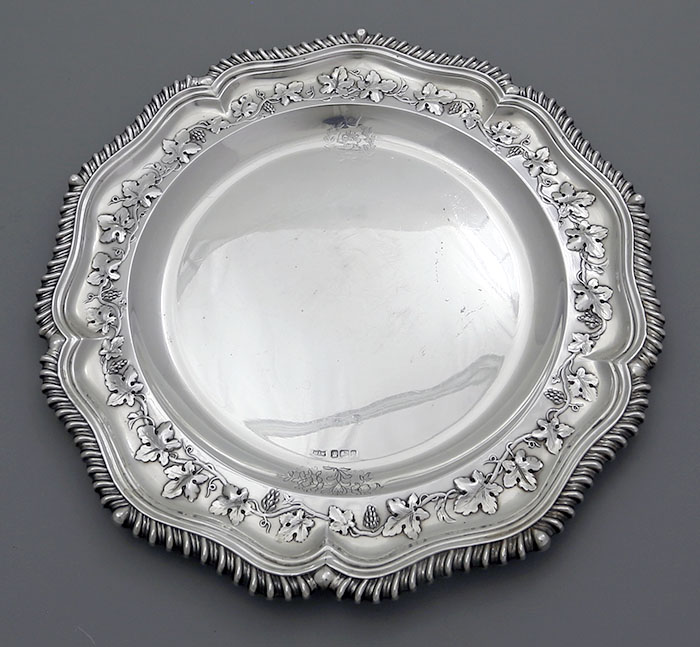 Mappin & Webb sterling silver plate with embossed leaves and crest  