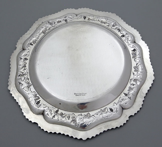 Mappin & Webb sterling silver plate with embossed leaves and crest  