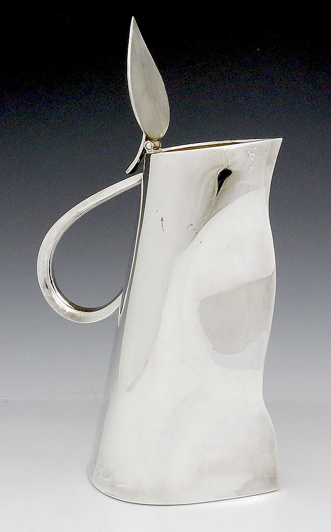 Ravissant sterling silver jug with hinged lid