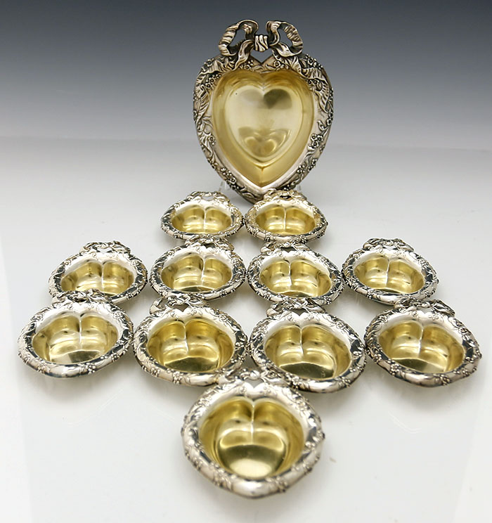 thirteen piece Reed & Barton sterling silver heart shaped bon bon set