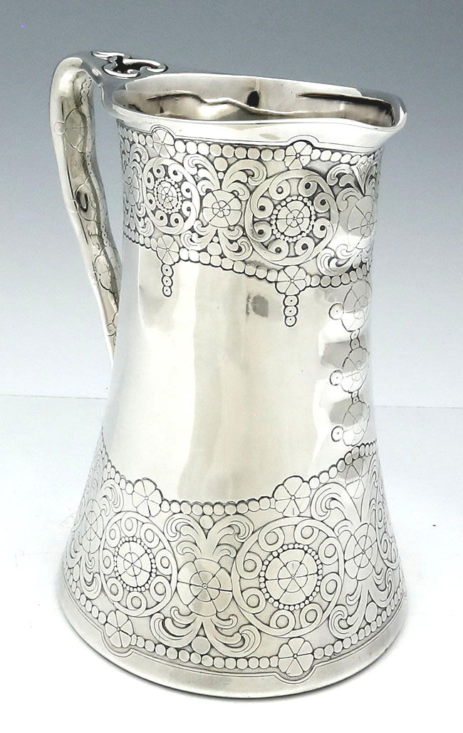 view from front of Tiffany antique sterling silver pitcher