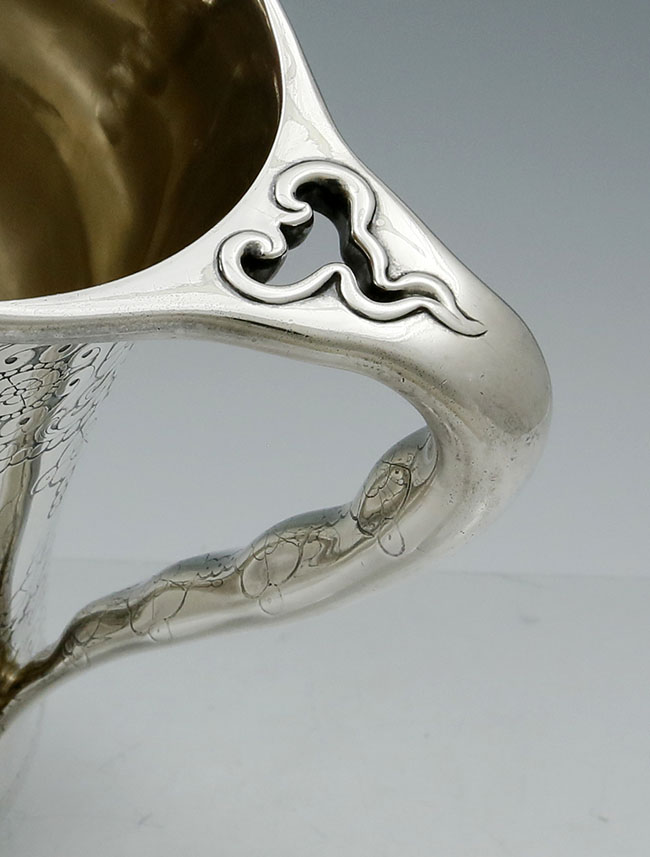 top of handle of Tiffany antique sterling silver pitcher