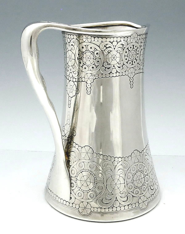 view of handle of Tiffany antique sterling pitcher