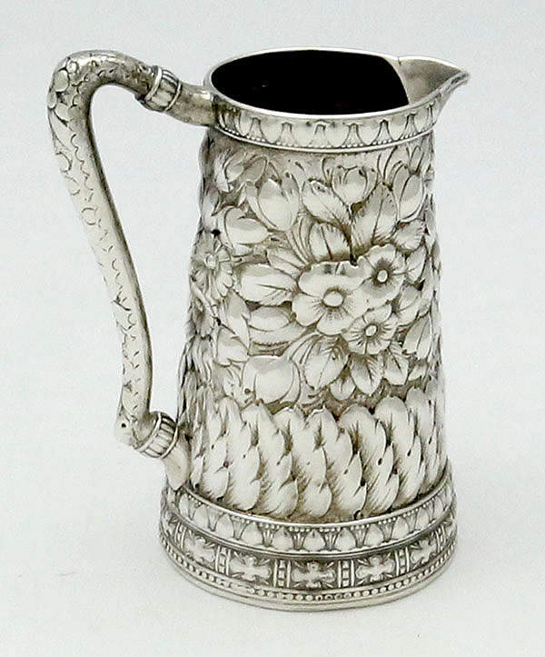 Tiffany antique sterling silver repousse pitcher