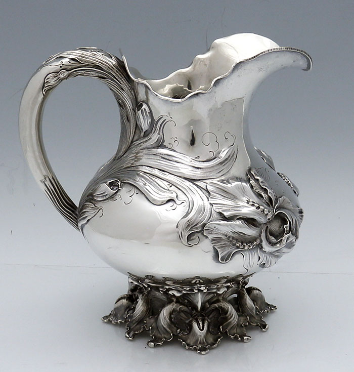 Antique sterling silver art nouveau pitcher with chased irises by Theodore Starr of New York