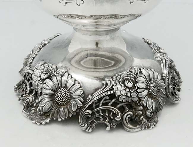 base of ornate antique silver loving cup