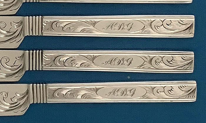 A E Warner coin silver tea knives