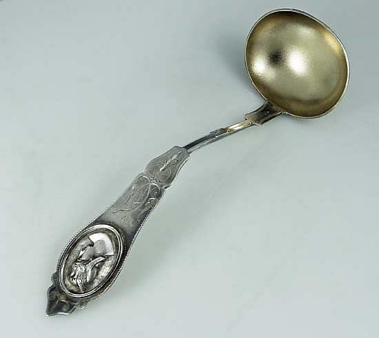 Duhme medallion coin silver oyster ladle