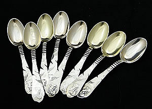 Eight sterling etruscan coffee spoons medallion silver