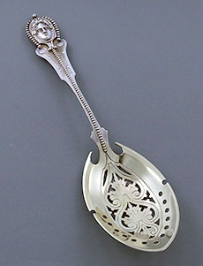 Wood & Hughes medallion mask face ice spoon coin silver