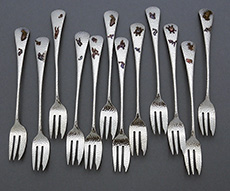 Set of Gorham sterling and mixed metals cocktail forks