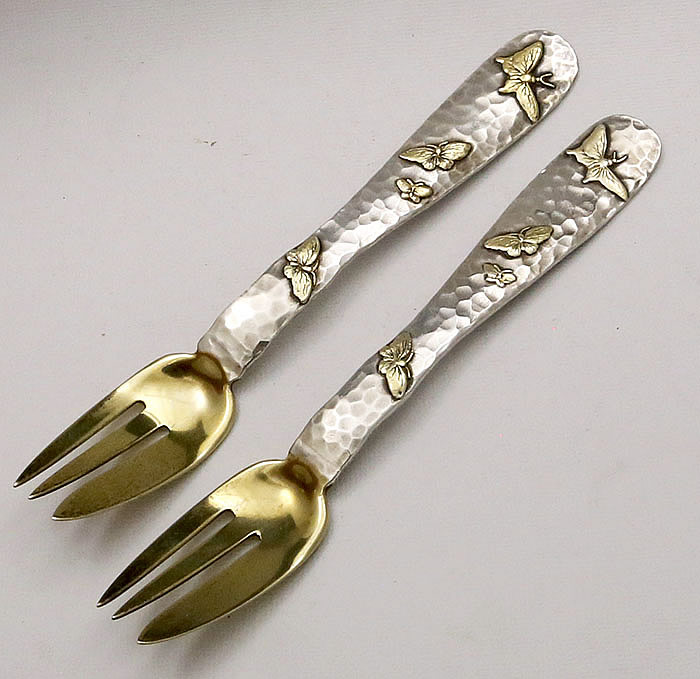 pair of Tiffany applied hammered butterflies forks