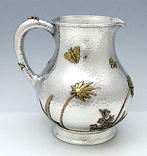Dominick & Haff Theodore B Starr mixed metals pitcher hammered and applied with salamander