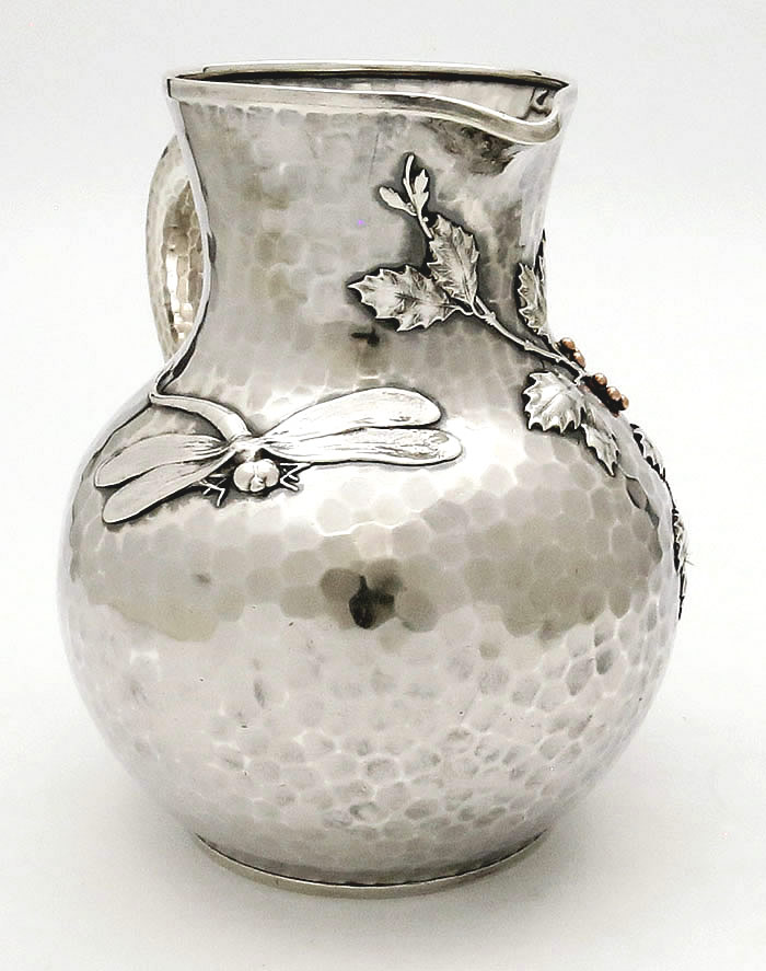 front of Whiting antique sterling silver hammered pitcher