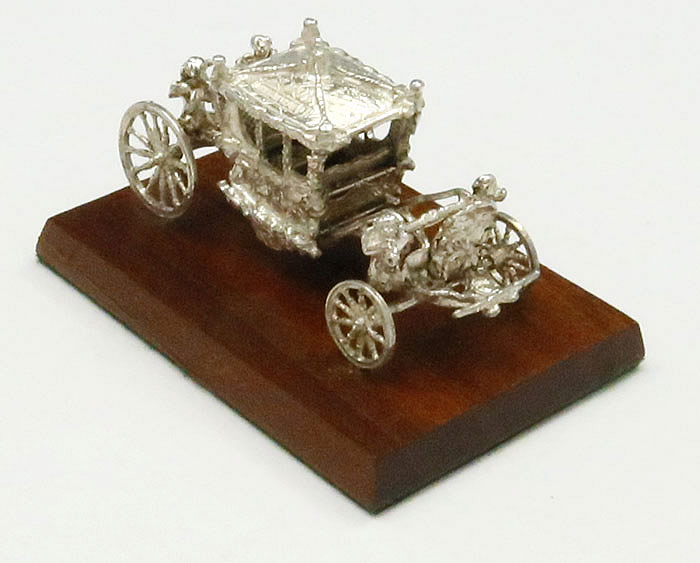 Miniature silver coach from the coronation by Toye Kenning and Spencer