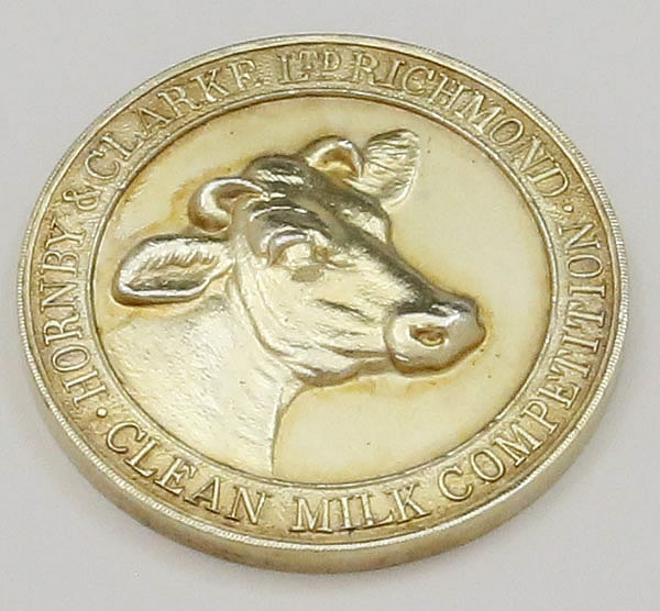 English hallmarked silver cow medals