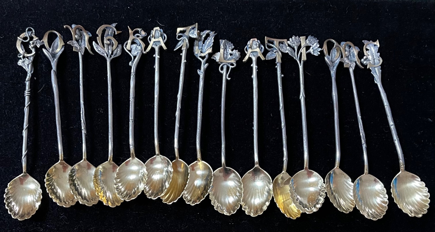 Gorham set of antique sterling silver spoons spelling out the word congratulations