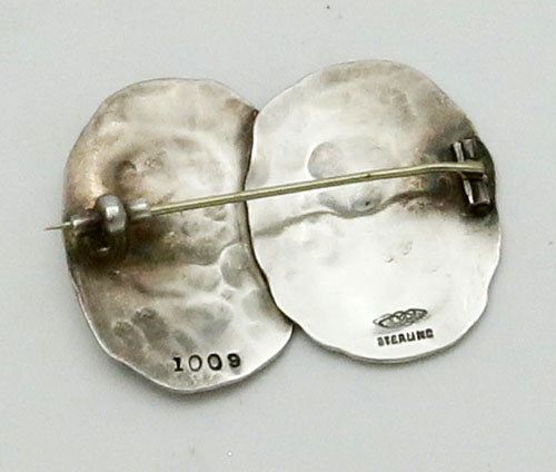 back of Shiebler etruscan pin