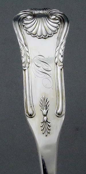detail of cartouche with script monogram on Taylor and Hinsdale coin silver stuffing spoon