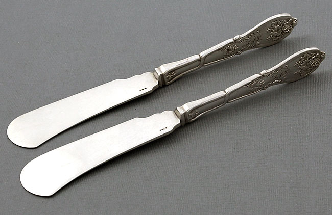 pair coin silver twisted butter knives