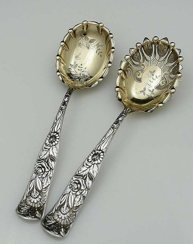 two antique sterling spoons retailed by A Stowell & Co
