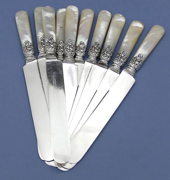 Ten mother of pearl luncheon knives