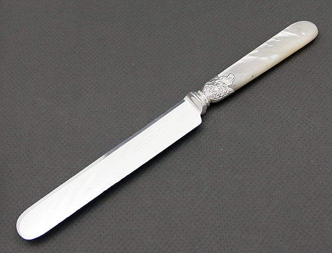 Mother of pearl handle dinner knife