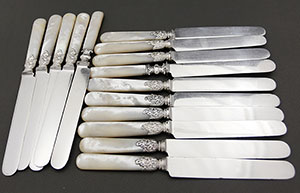 fifteen antique mother of pearl dinner knives