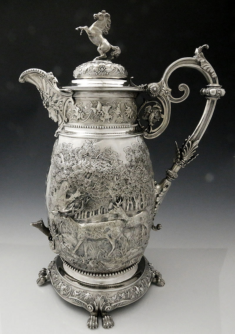 antique English silver flagon with applied stags and horse finial