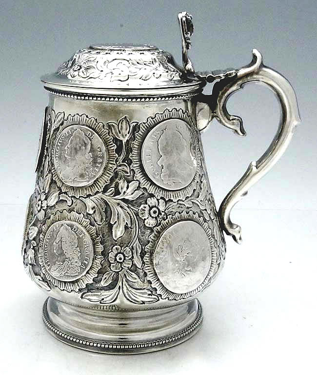 antique silver German tankard with inset silver coins from Great Britain