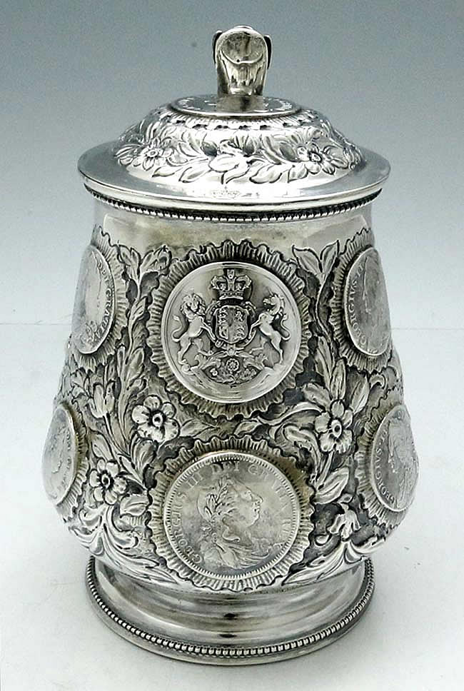 antique silver tankard with set silver crowns from Britain