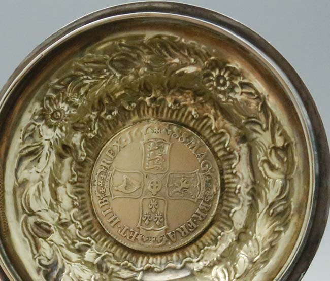 interior of lid showing reverse of silver coin dated 1688