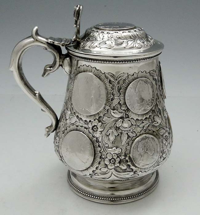 antique silver tankard with lid inset with coins
