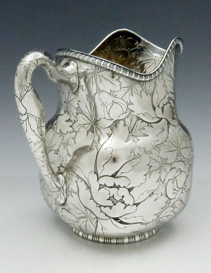 rare antique sterling silver pitcher by Gorham chaser Nicholas Heinzelman