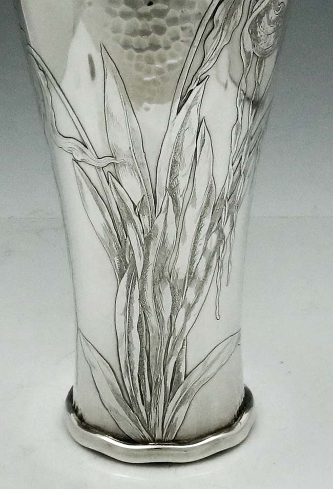 detail of etching on Tiffany and Company sterling silver vase