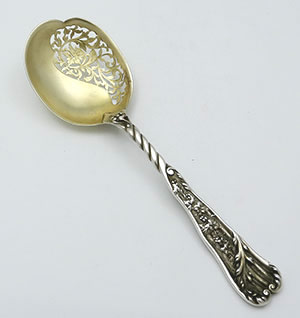 Rare cast sterling silver serving spoon by Reed & Barton with pierced bowl